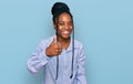 Young african american woman wearing casual clothes doing happy thumbs up gesture with hand
