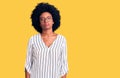 Young african american woman wearing casual clothes and glasses relaxed with serious expression on face Royalty Free Stock Photo