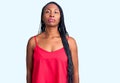 Young african american woman wearing casual clothes relaxed with serious expression on face Royalty Free Stock Photo