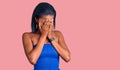 Young african american woman wearing casual summer clothes with sad expression covering face with hands while crying Royalty Free Stock Photo