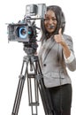 Young African American women with professional video camera and Royalty Free Stock Photo