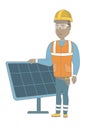 Young african-american worker of solar power plant