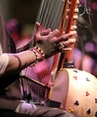 Young african boy plays a stringed instrument