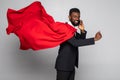 Young african businessman run and talking on the phone on white background Royalty Free Stock Photo