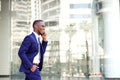 Young african businessman talking on cell phone Royalty Free Stock Photo