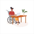 Young african disabled woman in wheelchair working at computer in comfortable office. Concept of diverse people Royalty Free Stock Photo