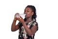 Young African girl with a bottle of mineral water Royalty Free Stock Photo