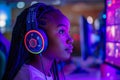 Young African Girl Wearing Headphones Competes In A Professional Video Game Tournament Royalty Free Stock Photo
