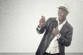 Young african guy looking at cell phone Royalty Free Stock Photo