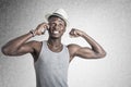 Young african guy looking at cell phone Royalty Free Stock Photo