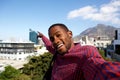 Young african guy taking a self portrait outside Royalty Free Stock Photo