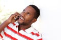 Young african guy talking on mobile phone Royalty Free Stock Photo