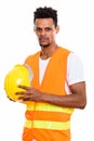 Young African man construction worker holding safety helmet with Royalty Free Stock Photo