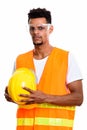 Young African man construction worker holding safety helmet with Royalty Free Stock Photo