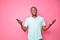 young african man feeling confident and assured holding his mobile phone and smiling Royalty Free Stock Photo