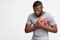 Young black guy having heart attack, holding his chest Royalty Free Stock Photo