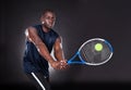 Young african man playing tennis Royalty Free Stock Photo