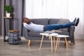 Man Sleeping On Sofa Royalty Free Stock Photo