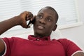 Young African Man Talking On Cellphone Royalty Free Stock Photo