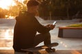 Young african man using mobile phone Royalty Free Stock Photo