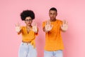 Young african man and woman showing stop gesture at camera together isolated Royalty Free Stock Photo