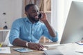 Young african man working in the office business