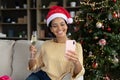 Young african mixed race woman recording video on cellphone.