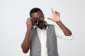 Young african photographer at work at studio.