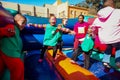 Young African Preschool children having fun on a jumping castle on the playground Royalty Free Stock Photo