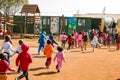 Young African Preschool kids playing in the playground of a kindergarten school Royalty Free Stock Photo