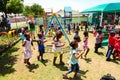 Young African Preschool kids playing in the playground of a kindergarten school Royalty Free Stock Photo