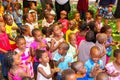 Young African Preschool kids singing songs in the playground of a kindergarten school