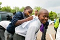 Young African primary school children writing