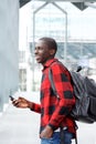 Young african student at railway station