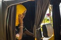 young african woman sitting alone in a rickshaw looking sad and tired Royalty Free Stock Photo