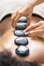 Hot stone massage at spa Royalty Free Stock Photo