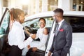 Young woman surprised by new car, gift for my beautiful wife Royalty Free Stock Photo