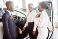 Young woman surprised by new car, gift for my beautiful wife Royalty Free Stock Photo