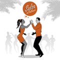 Young afro american couple dancing salsa.