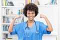 Young afro american female nurse ready for vaccinating patients