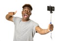 Young afro american man smiling happy taking selfie self portrait picture with mobile phone Royalty Free Stock Photo