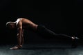 Young afro american sports man with beautiful muscular body doing pushup exercise Royalty Free Stock Photo