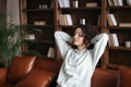 Young afro american woman resting  sitting on couch Royalty Free Stock Photo