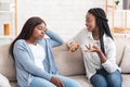 Young afro girl tired of her talkative friend Royalty Free Stock Photo