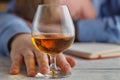 Young alcoholic man drinking whisky in his home. Royalty Free Stock Photo