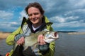 Young amateur angler hold the Asp fish Royalty Free Stock Photo