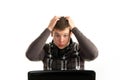 Young amazed businessman working on a laptop Royalty Free Stock Photo