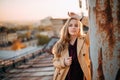 Young amazing pretty girl on the roof