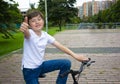 A young American boy child riding bicycle Royalty Free Stock Photo