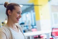 Young American business woman sitting at her desk and smiling Royalty Free Stock Photo